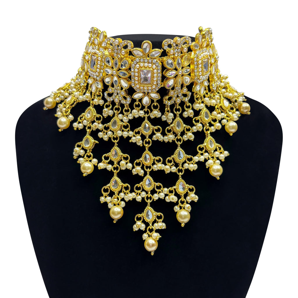 • Clothing: Embroidered/Printed suit for women - Made of best quality fabric - lawn or linen or chiffon - pure silk - Available at Najma Designs & Co. • Jewelry: Gold - plated stud earrings for