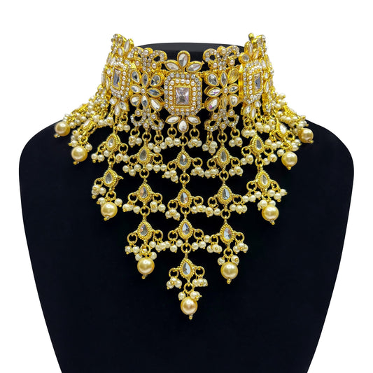 • Clothing: Embroidered/Printed suit for women - Made of best quality fabric - lawn or linen or chiffon - pure silk - Available at Najma Designs & Co. • Jewelry: Gold - plated stud earrings for