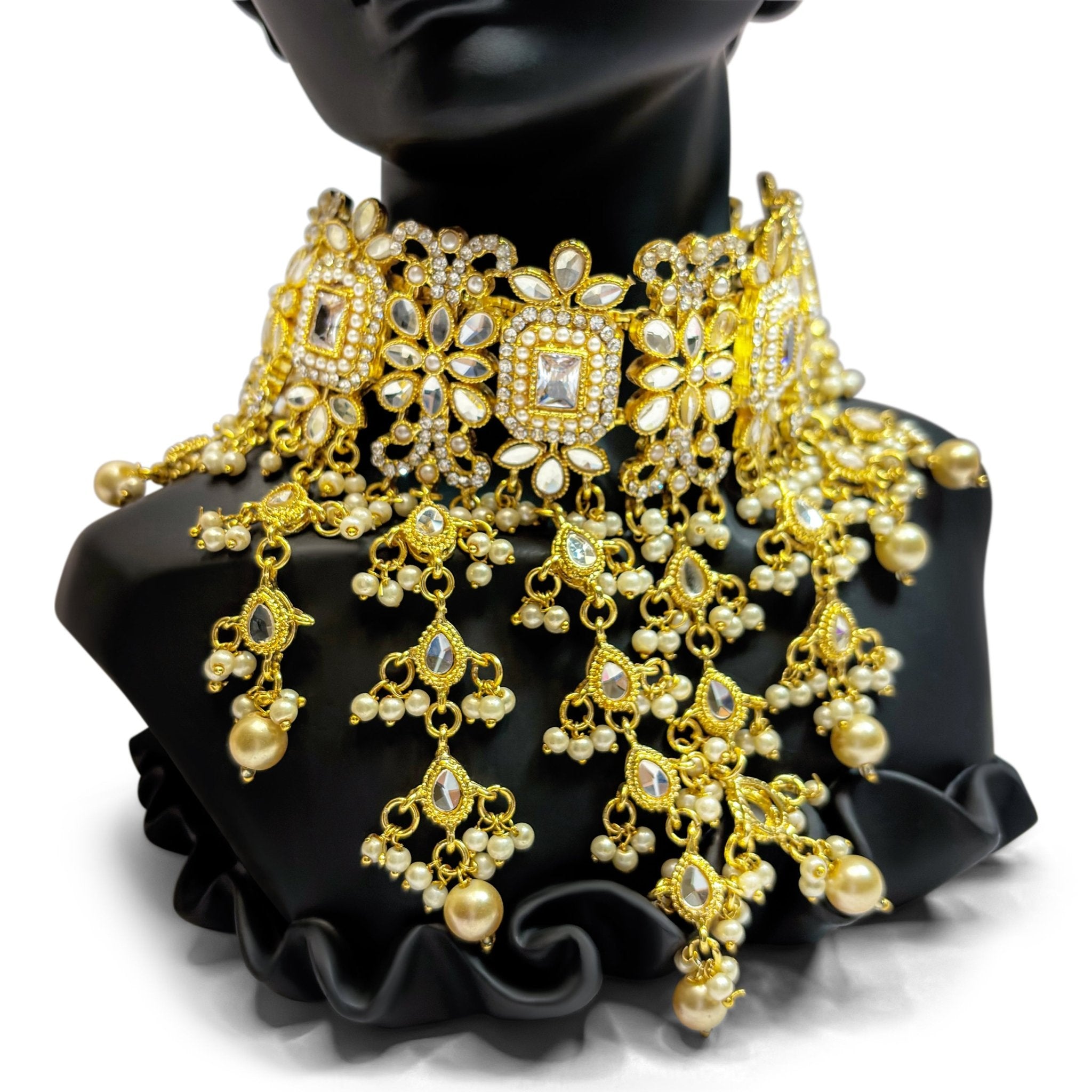 • Clothing: Embroidered/Printed suit for women - Made of best quality fabric - lawn or linen or chiffon - pure silk - Available at Najma Designs & Co. • Jewelry: Gold - plated stud earrings for