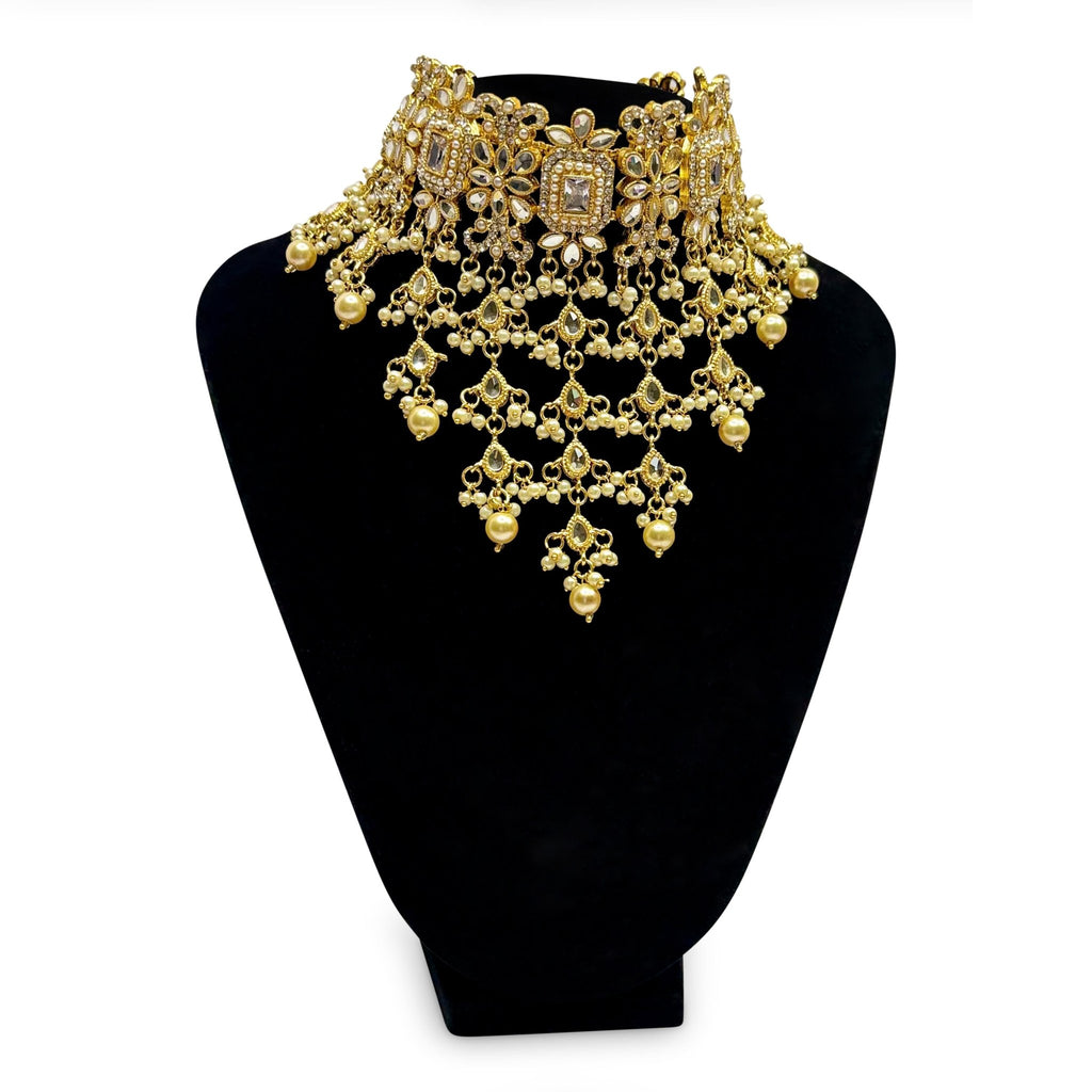 • Clothing: Embroidered/Printed suit for women - Made of best quality fabric - lawn or linen or chiffon - pure silk - Available at Najma Designs & Co. • Jewelry: Gold - plated stud earrings for