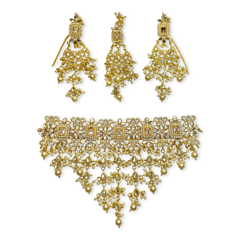 • Clothing: Embroidered/Printed suit for women - Made of best quality fabric - lawn or linen or chiffon - pure silk - Available at Najma Designs & Co. • Jewelry: Gold - plated stud earrings for