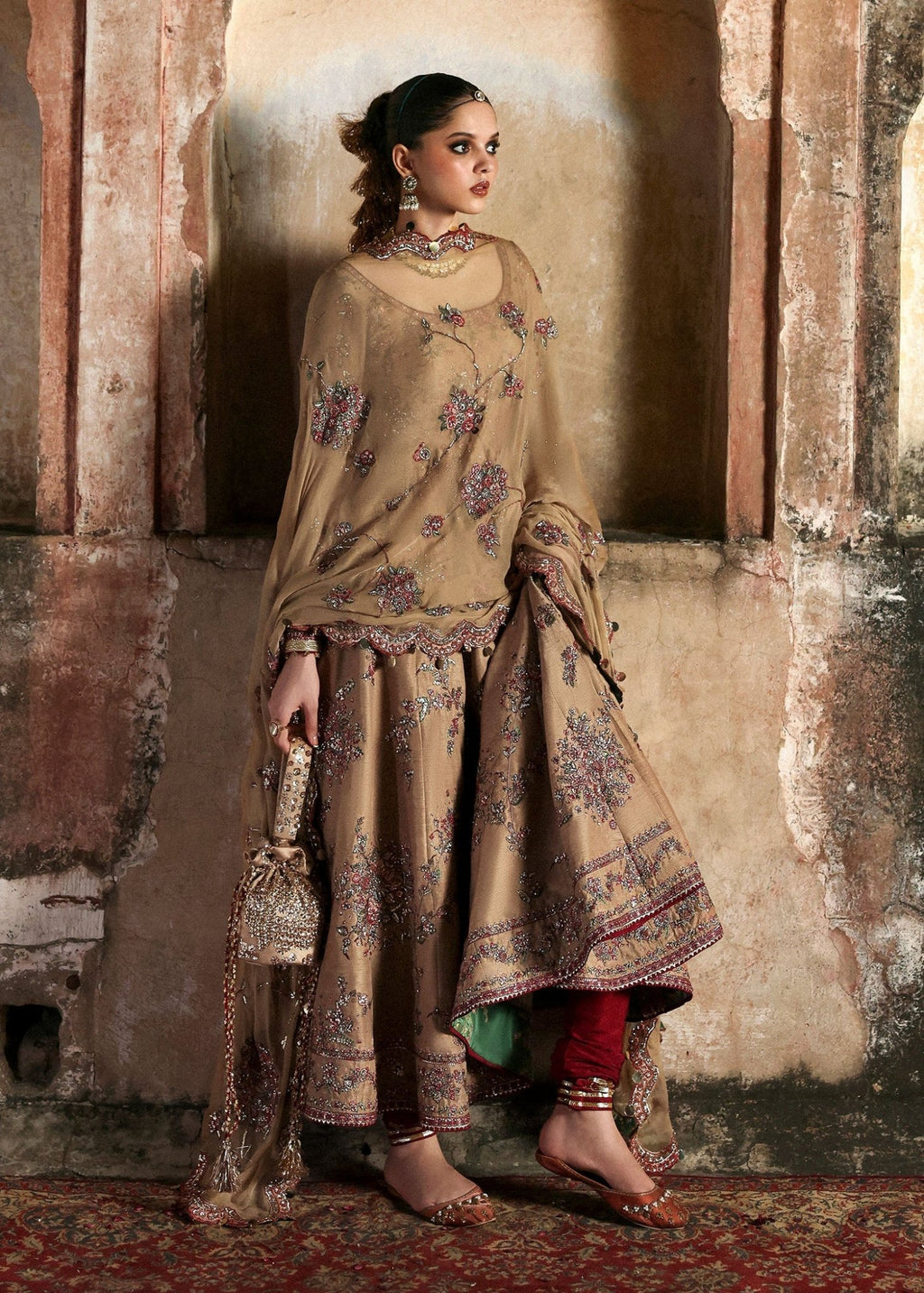 • Clothing: Embroidered/Printed suit for women - Made of best quality fabric - lawn or linen or chiffon - pure silk - Available at Najma Designs & Co. • Jewelry: Gold - plated stud earrings for
