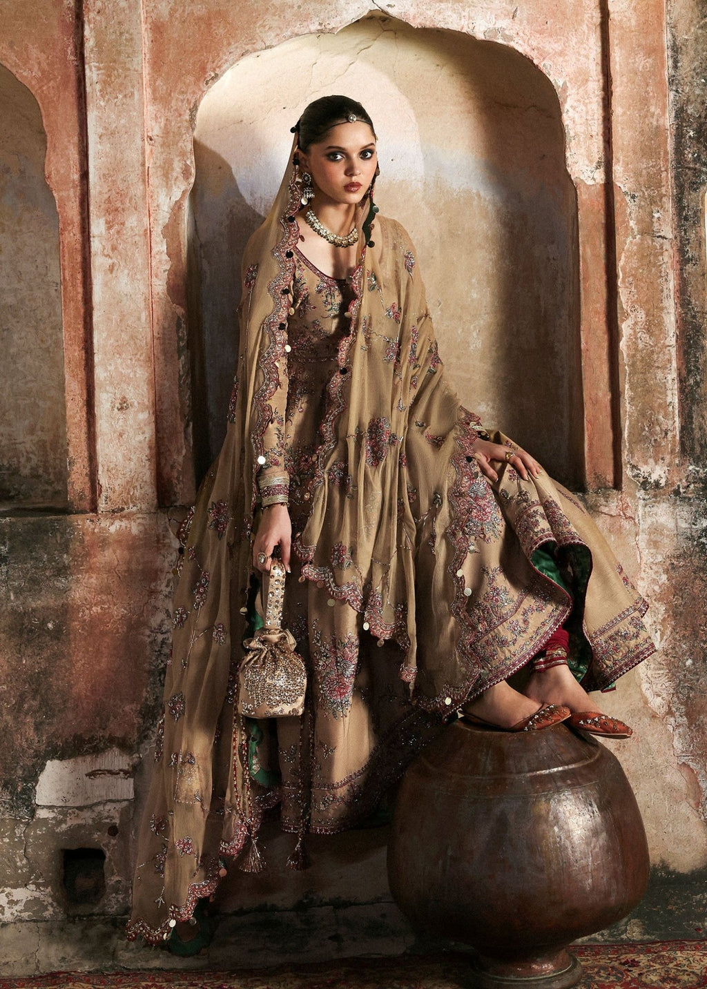 • Clothing: Embroidered/Printed suit for women - Made of best quality fabric - lawn or linen or chiffon - pure silk - Available at Najma Designs & Co. • Jewelry: Gold - plated stud earrings for
