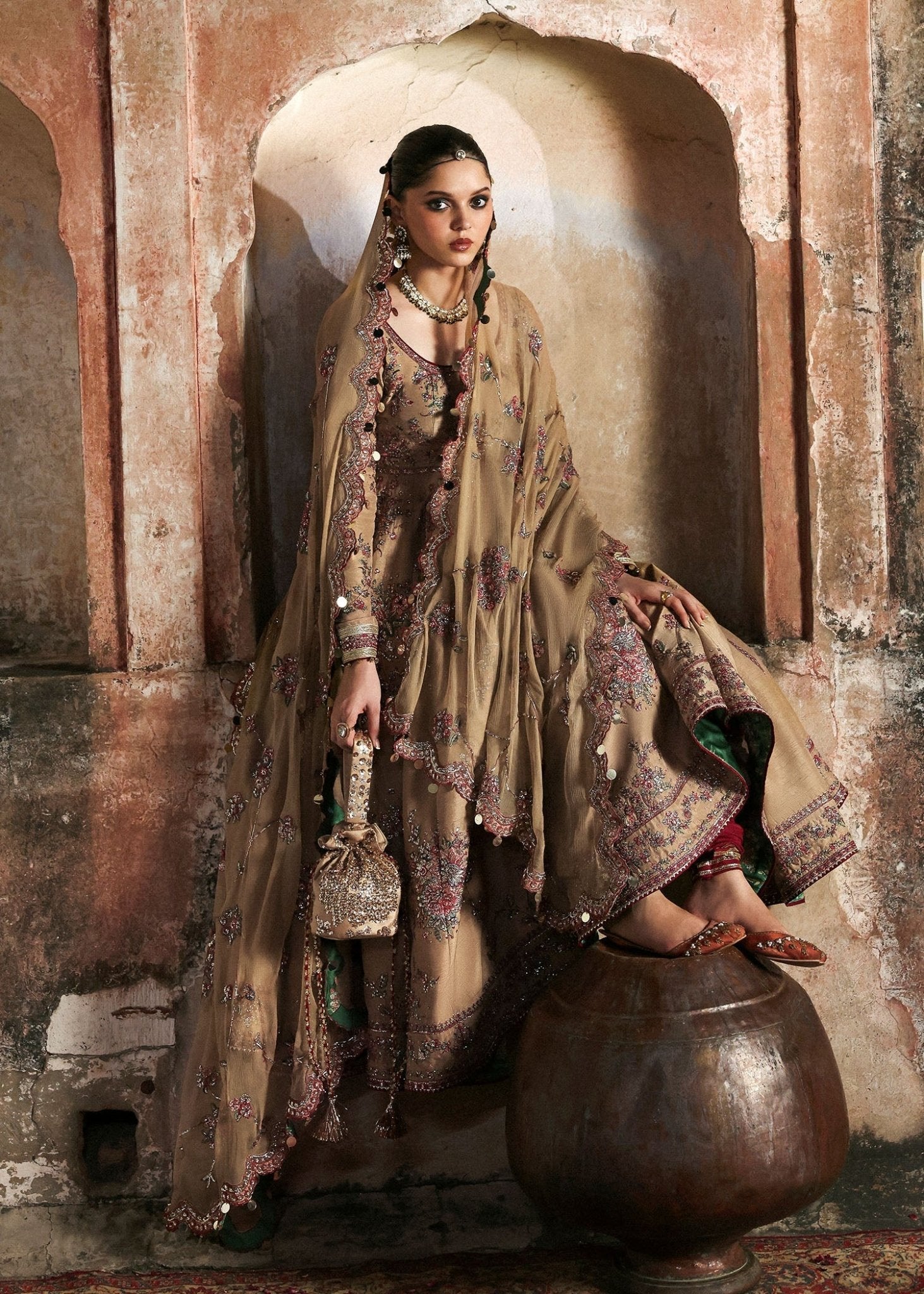 • Clothing: Embroidered/Printed suit for women - Made of best quality fabric - lawn or linen or chiffon - pure silk - Available at Najma Designs & Co. • Jewelry: Gold - plated stud earrings for