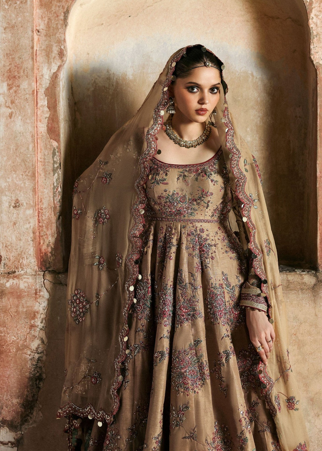 • Clothing: Embroidered/Printed suit for women - Made of best quality fabric - lawn or linen or chiffon - pure silk - Available at Najma Designs & Co. • Jewelry: Gold - plated stud earrings for