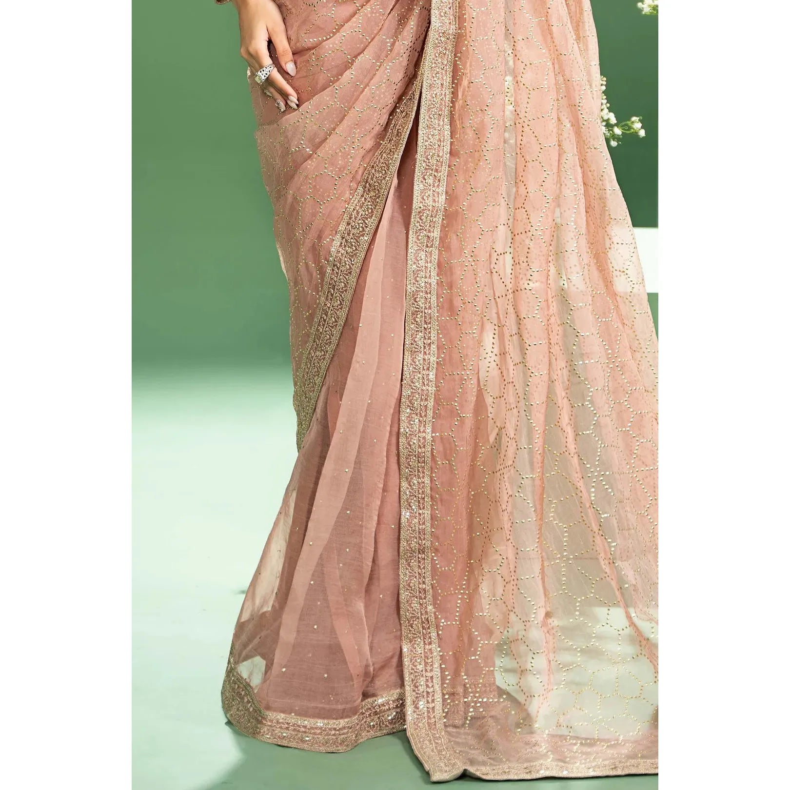 Maria B Embroidered Saree Set in Peach Color - Hand Embellished Boat Neck Blouse with Organza Border, Pink Raw Silk Saree with Mukaish & Sequins Embroidery, Crystals & Pearls Embellishment, Regular Fit, Dry Clean Only, Model Wearing XS Size
