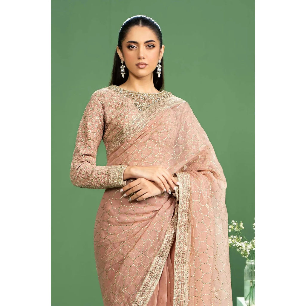 Maria B Embroidered Saree Set in Peach Color - Hand Embellished Boat Neck Blouse with Organza Border, Pink Raw Silk Saree with Mukaish & Sequins Embroidery, Crystals & Pearls Embellishment, Regular Fit, Dry Clean Only, Model Wearing XS Size