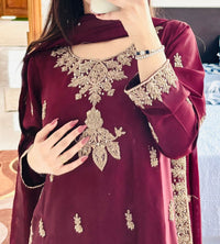 • Clothing: Embroidered/Printed suit for women - Made of best quality fabric - lawn or linen or chiffon- pure silk - Available at Najma Designs & Co. • Jewelry: Gold-plated stud earrings for