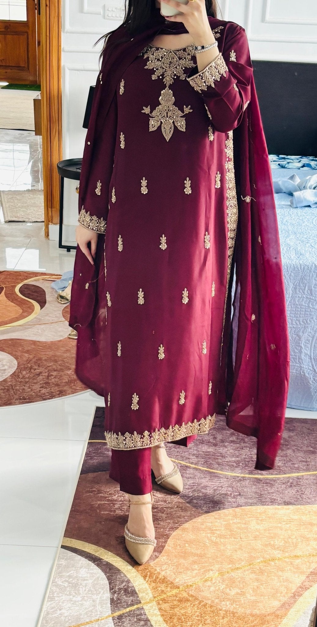 • Clothing: Embroidered/Printed suit for women - Made of best quality fabric - lawn or linen or chiffon- pure silk - Available at Najma Designs & Co. • Jewelry: Gold-plated stud earrings for