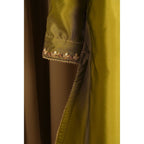 close up of Mehndi-colored silk hand-embroidered gota gharara suit with crystal work.