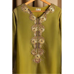 close up of Mehndi-colored silk hand-embroidered gota gharara suit with crystal work.