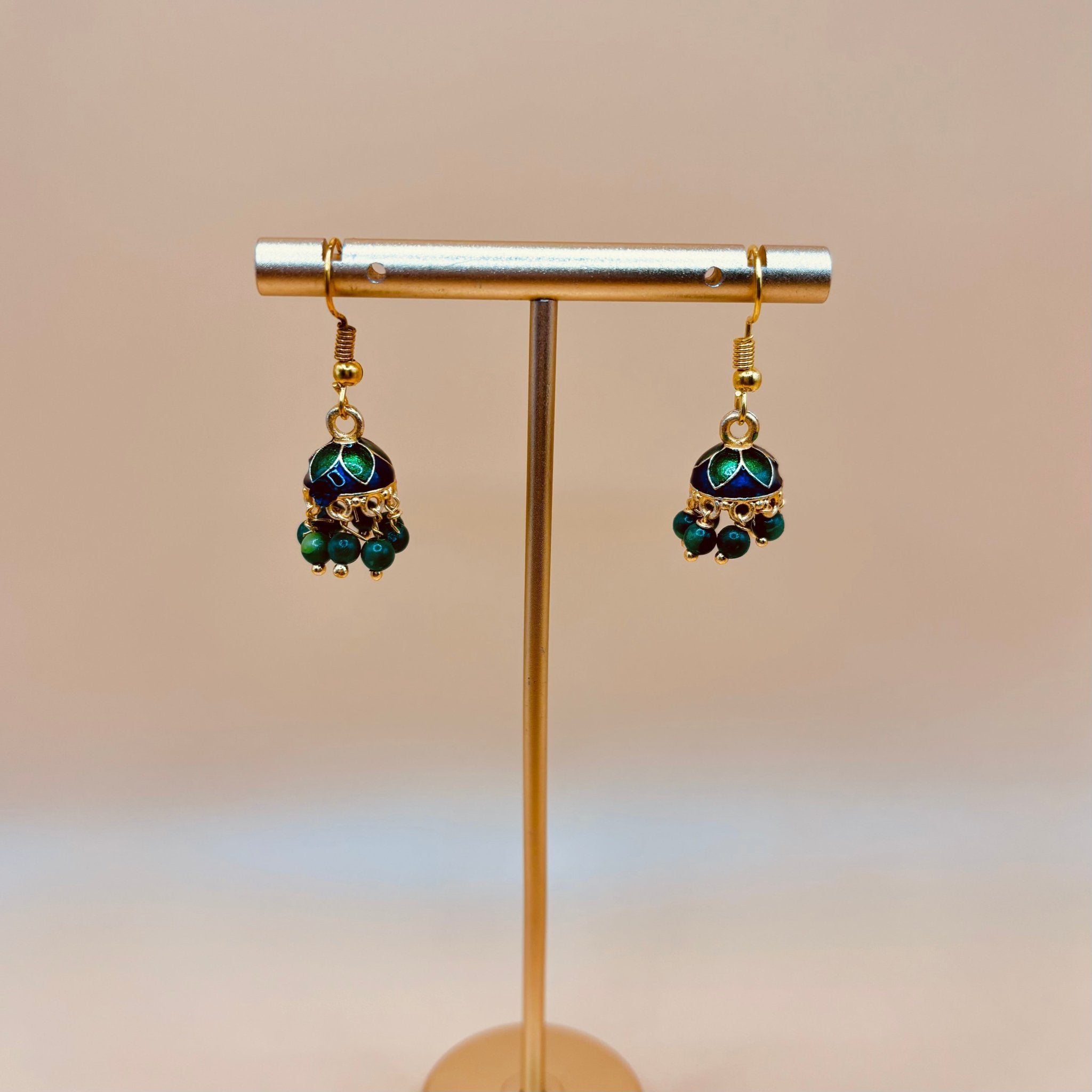 • Clothing: Embroidered/Printed suit for women - Made of best quality fabric - lawn or linen or chiffon - pure silk - Available at Najma Designs & Co. • Jewelry: Gold - plated stud earrings for