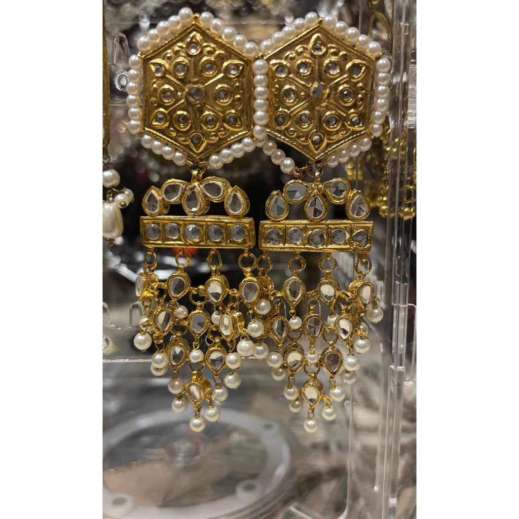 • Clothing: Embroidered/Printed suit for women - Made of best quality fabric - lawn or linen or chiffon - pure silk - Available at Najma Designs & Co. • Jewelry: Gold - plated stud earrings for