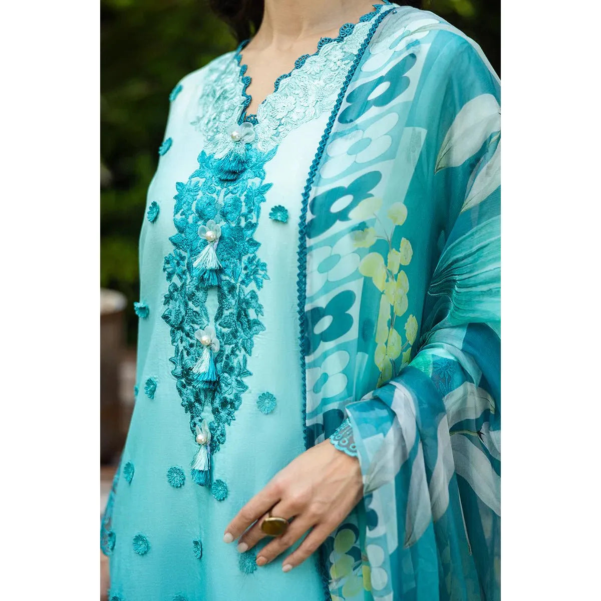 • Clothing: Embroidered/Printed suit for women - Made of best quality fabric - lawn or linen or chiffon - pure silk - Available at Najma Designs & Co. • Jewelry: Gold - plated stud earrings for