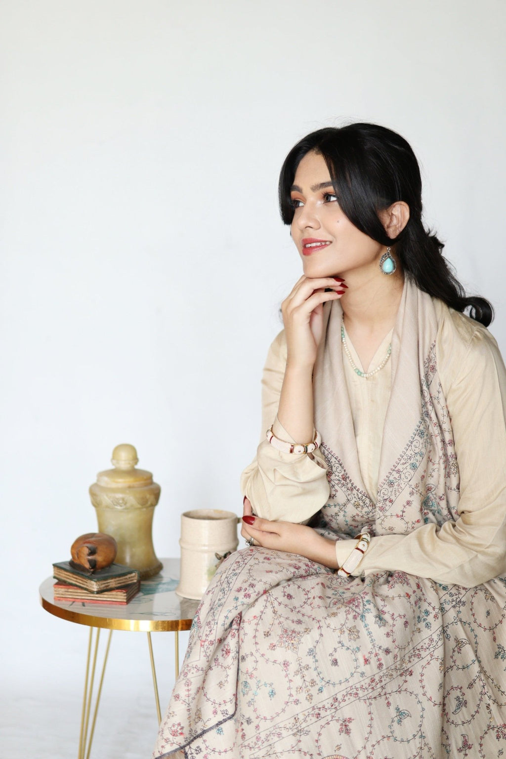 • Clothing: Embroidered/Printed suit for women - Made of best quality fabric - lawn or linen or chiffon - pure silk - Available at Najma Designs & Co. • Jewelry: Gold - plated stud earrings for