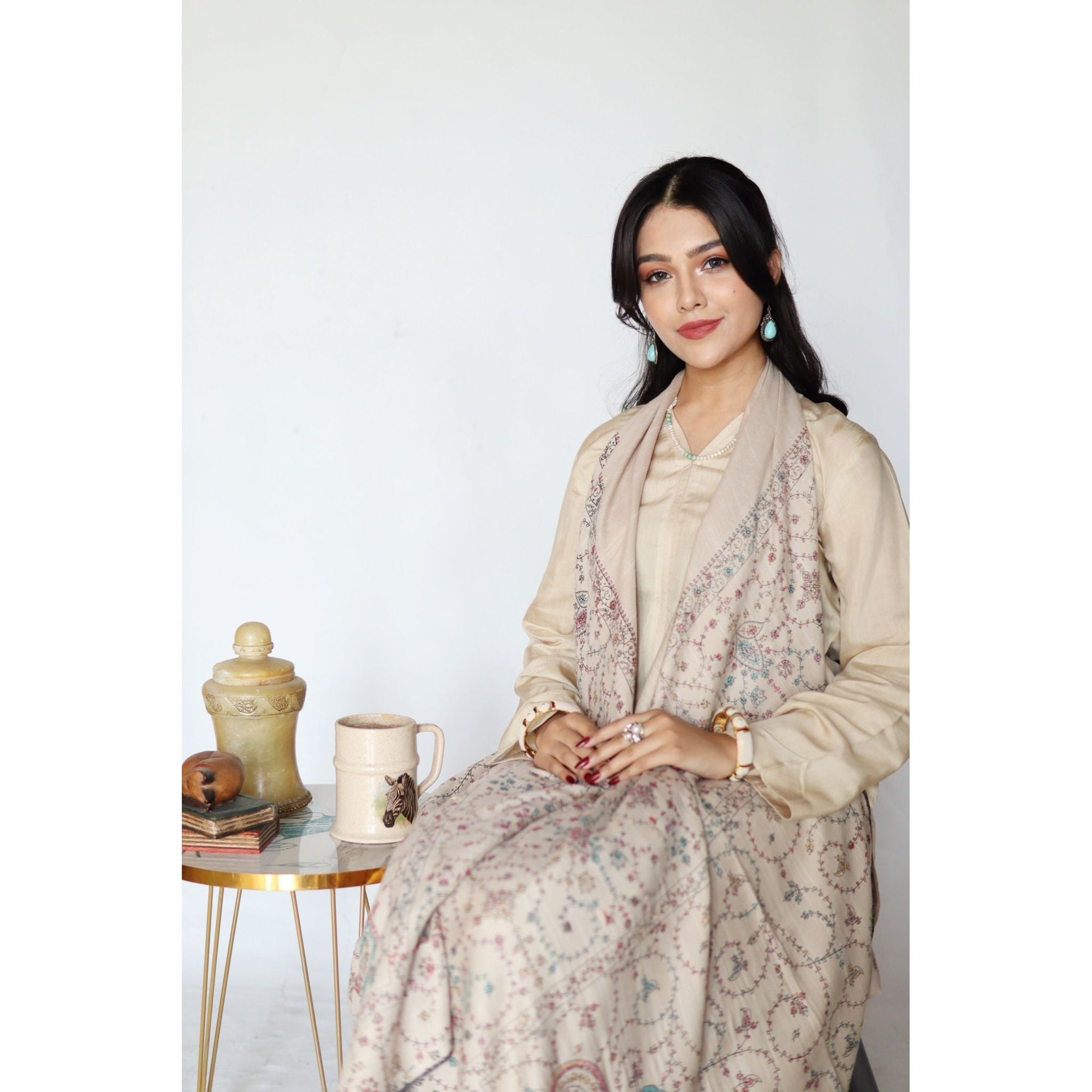 • Clothing: Embroidered/Printed suit for women - Made of best quality fabric - lawn or linen or chiffon - pure silk - Available at Najma Designs & Co. • Jewelry: Gold - plated stud earrings for