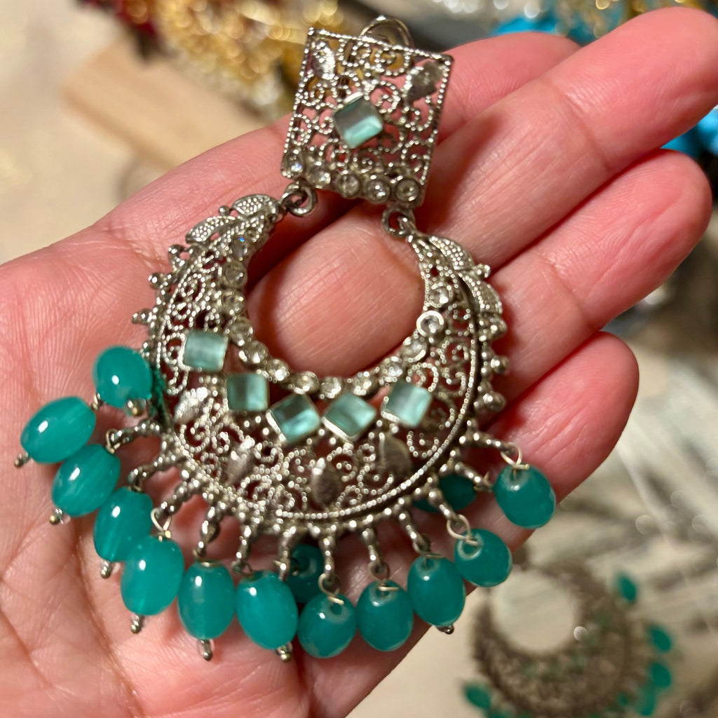 • Clothing: Embroidered/Printed suit for women - Made of best quality fabric - lawn or linen or chiffon - pure silk - Available at Najma Designs & Co. • Jewelry: Gold - plated stud earrings for