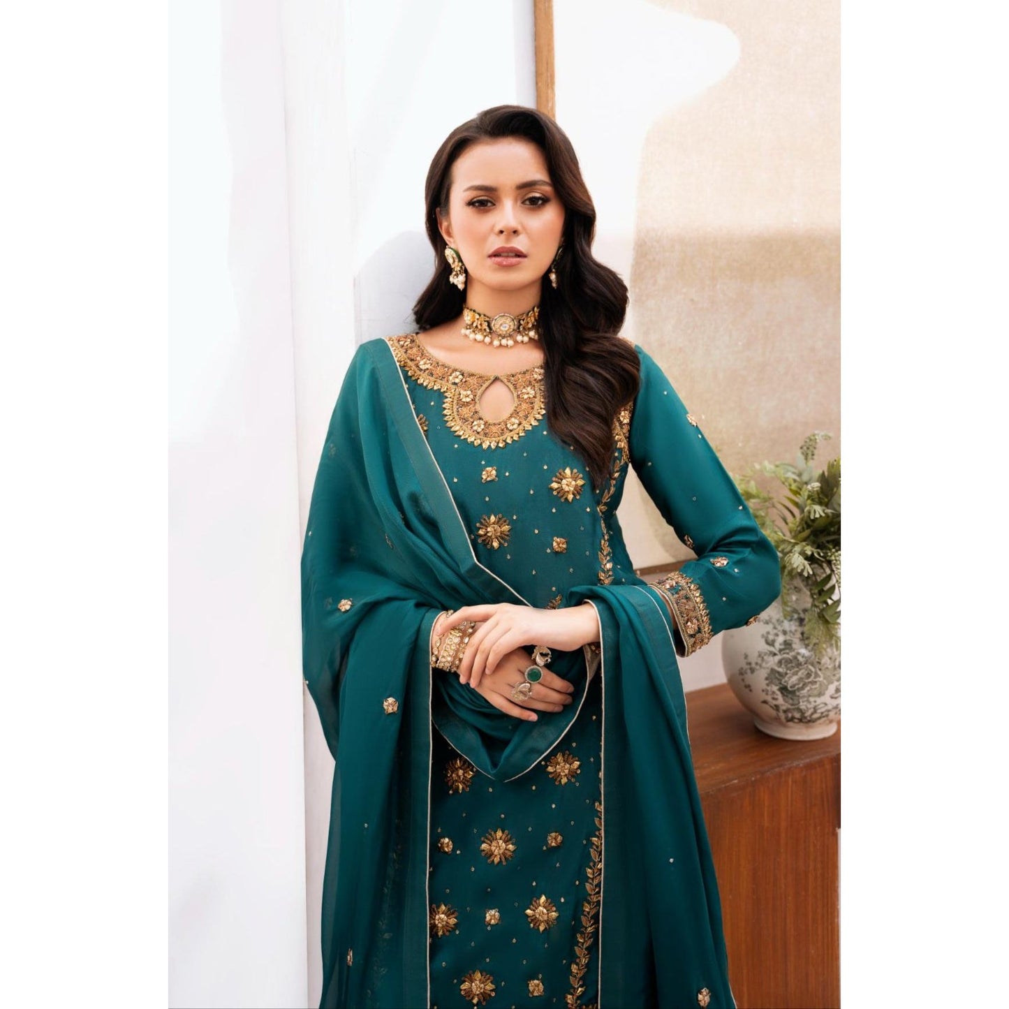 • Clothing: Embroidered/Printed suit for women - Made of best quality fabric - lawn or linen or chiffon - pure silk - Available at Najma Designs & Co. • Jewelry: Gold - plated stud earrings for