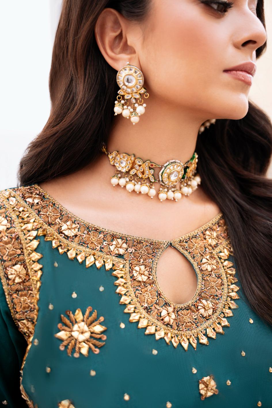 • Clothing: Embroidered/Printed suit for women - Made of best quality fabric - lawn or linen or chiffon - pure silk - Available at Najma Designs & Co. • Jewelry: Gold - plated stud earrings for