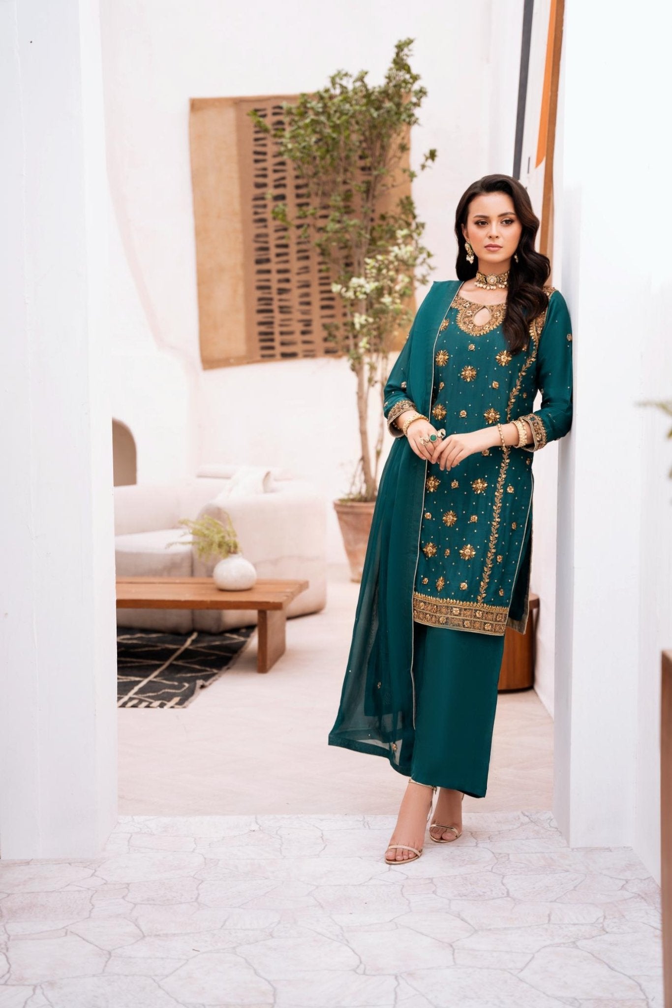 • Clothing: Embroidered/Printed suit for women - Made of best quality fabric - lawn or linen or chiffon - pure silk - Available at Najma Designs & Co. • Jewelry: Gold - plated stud earrings for