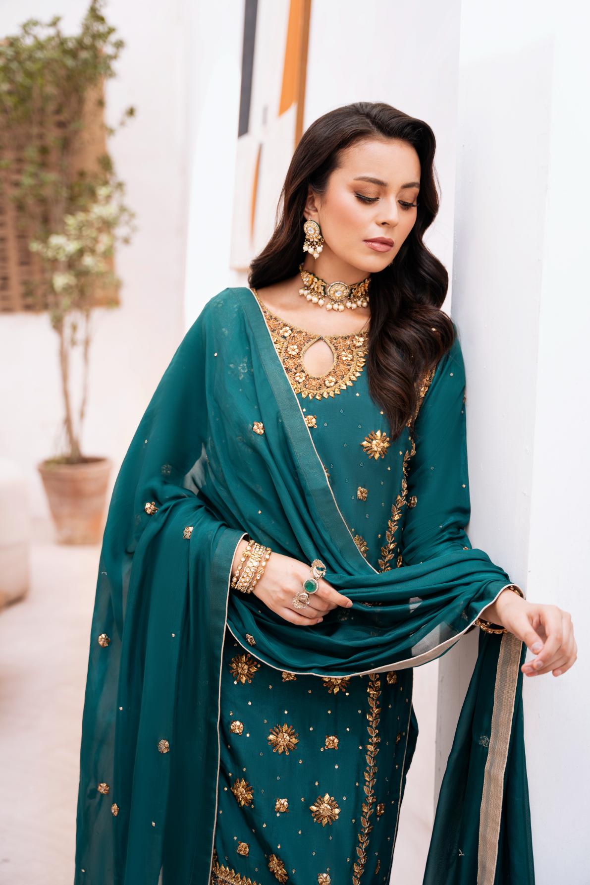 • Clothing: Embroidered/Printed suit for women - Made of best quality fabric - lawn or linen or chiffon - pure silk - Available at Najma Designs & Co. • Jewelry: Gold - plated stud earrings for