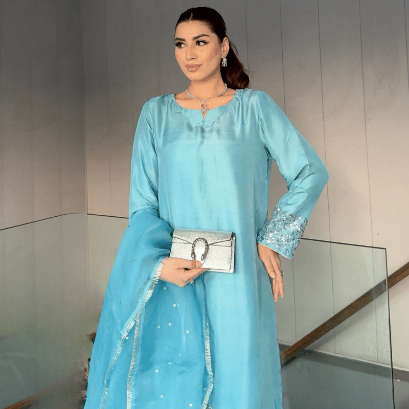 • Clothing: Embroidered/Printed suit for women - Made of best quality fabric - lawn or linen or chiffon - pure silk - Available at Najma Designs & Co. • Jewelry: Gold - plated stud earrings for