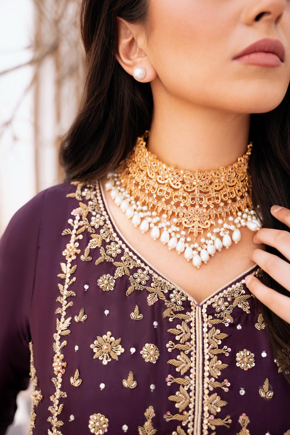• Clothing: Embroidered/Printed suit for women - Made of best quality fabric - lawn or linen or chiffon - pure silk - Available at Najma Designs & Co. • Jewelry: Gold - plated stud earrings for