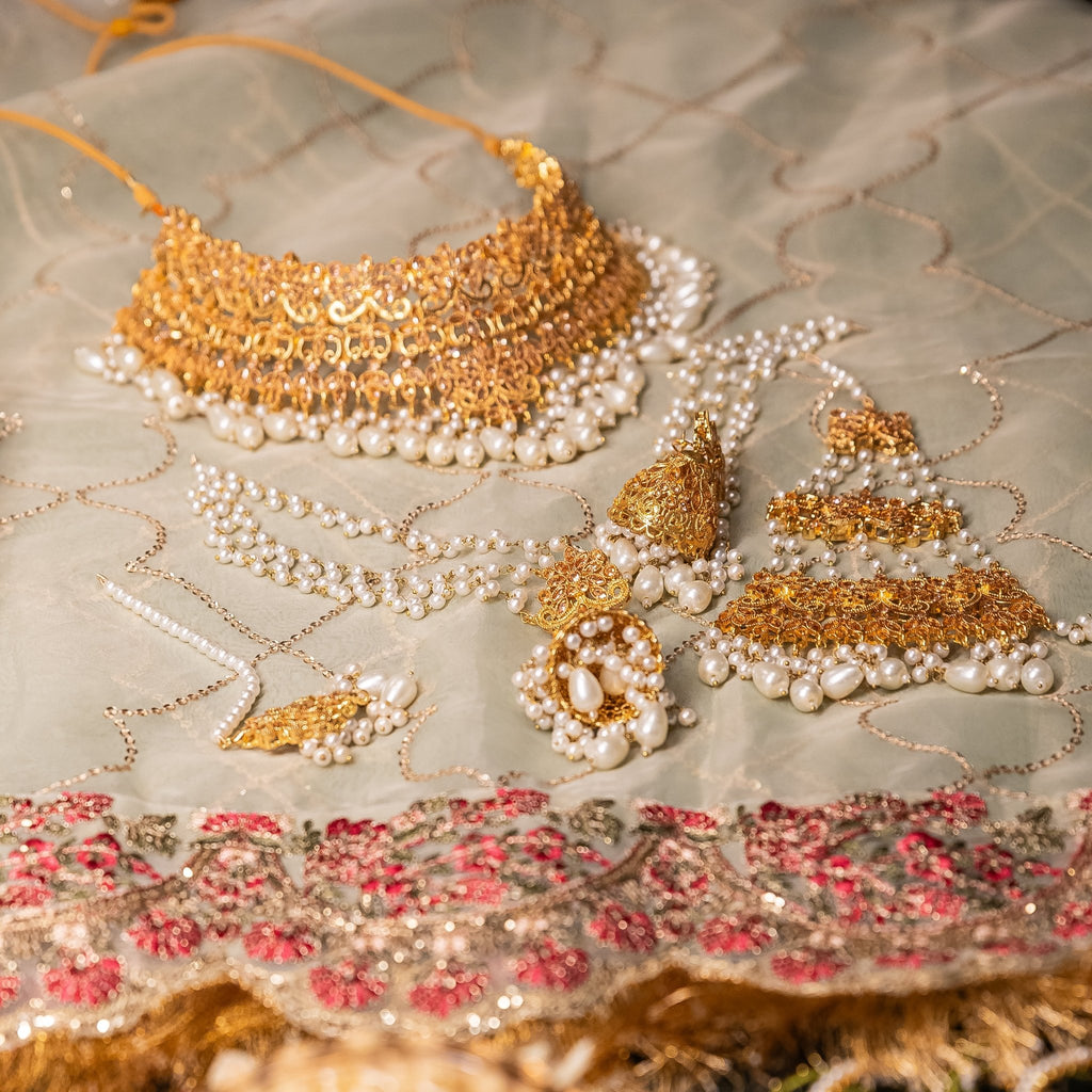 • Clothing: Embroidered/Printed suit for women - Made of best quality fabric - lawn or linen or chiffon - pure silk - Available at Najma Designs & Co. • Jewelry: Gold - plated stud earrings for
