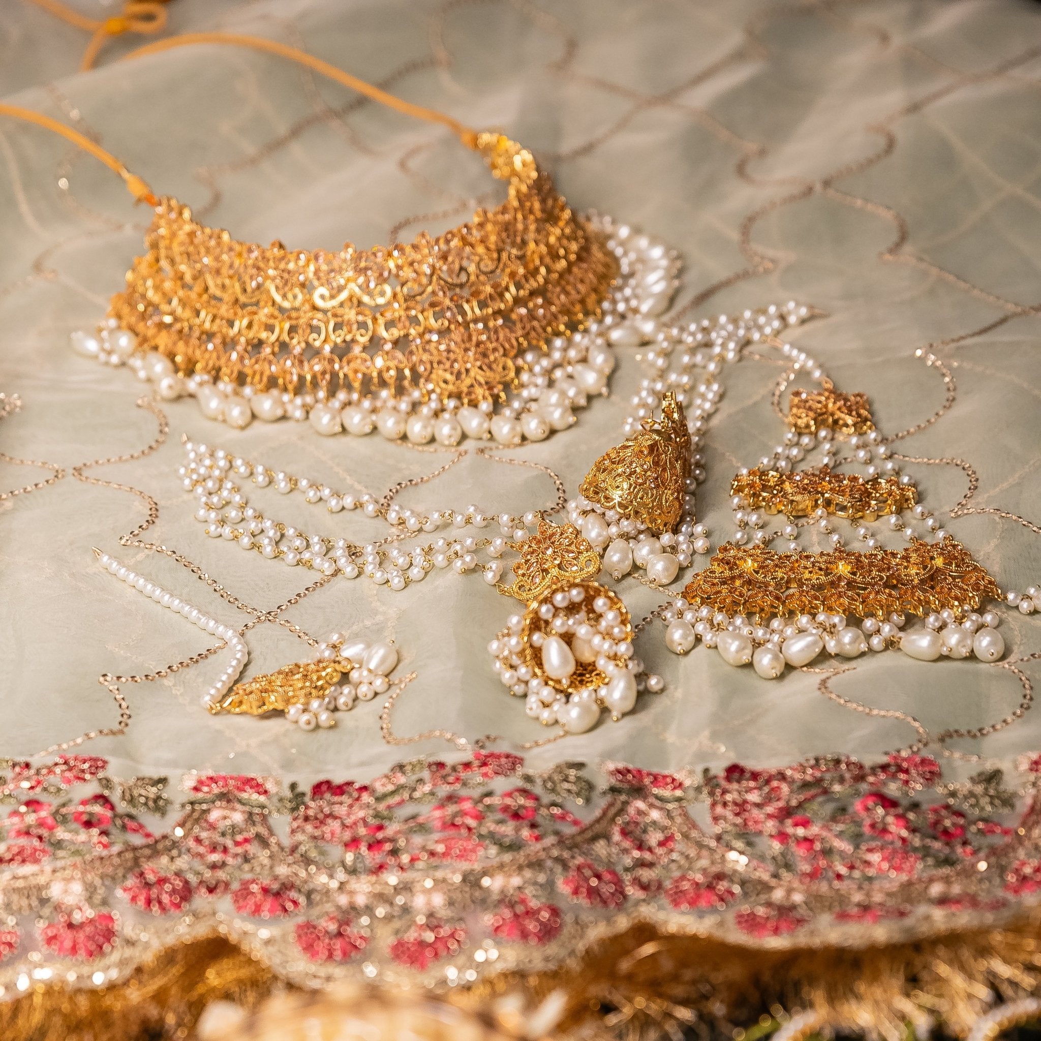 • Clothing: Embroidered/Printed suit for women - Made of best quality fabric - lawn or linen or chiffon - pure silk - Available at Najma Designs & Co. • Jewelry: Gold - plated stud earrings for
