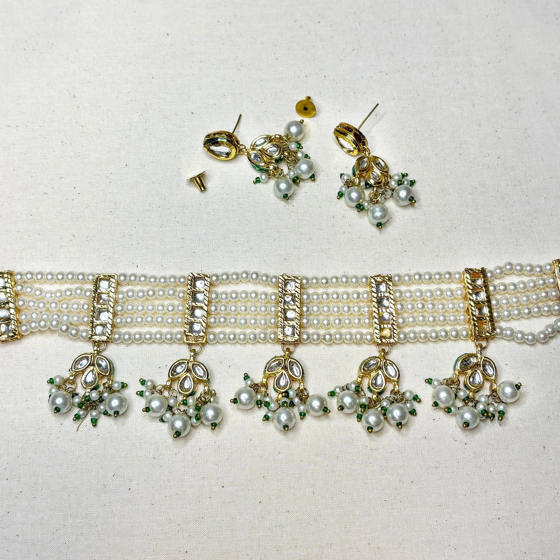 • Clothing: Embroidered/Printed suit for women - Made of best quality fabric - lawn or linen or chiffon - pure silk - Available at Najma Designs & Co. • Jewelry: Gold - plated stud earrings for