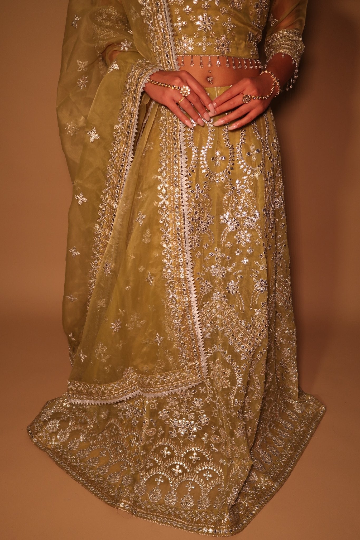 • Clothing: Embroidered/Printed suit for women - Made of best quality fabric - lawn or linen or chiffon- pure silk - Available at Najma Designs & Co. • Jewelry: Gold-plated stud earrings for
