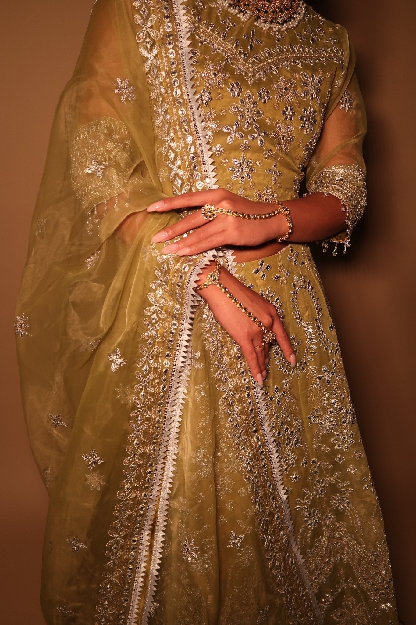 • Clothing: Embroidered/Printed suit for women - Made of best quality fabric - lawn or linen or chiffon- pure silk - Available at Najma Designs & Co. • Jewelry: Gold-plated stud earrings for