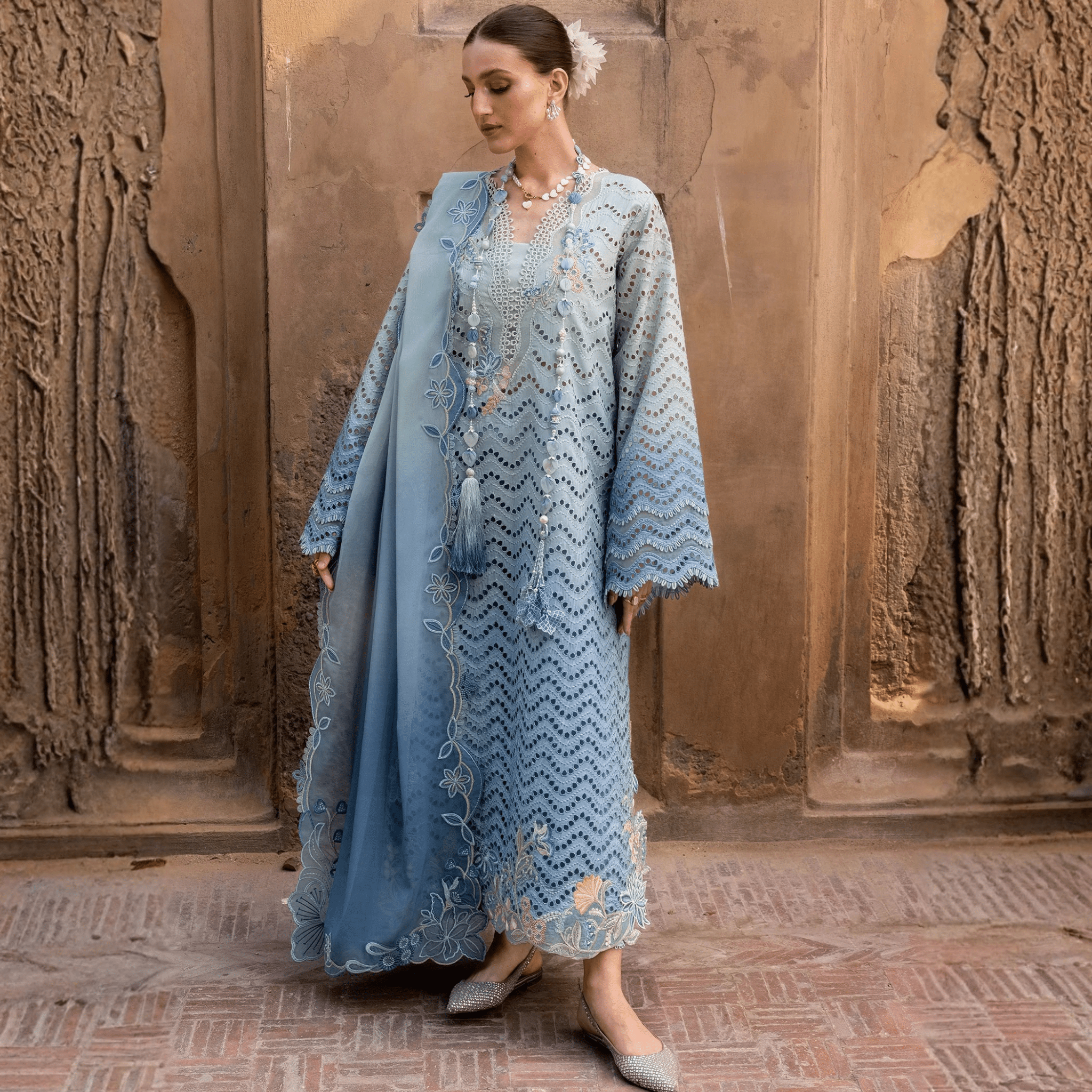 • Clothing: Embroidered/Printed suit for women - Made of best quality fabric - lawn or linen or chiffon - pure silk - Available at Najma Designs & Co. • Jewelry: Gold - plated stud earrings for