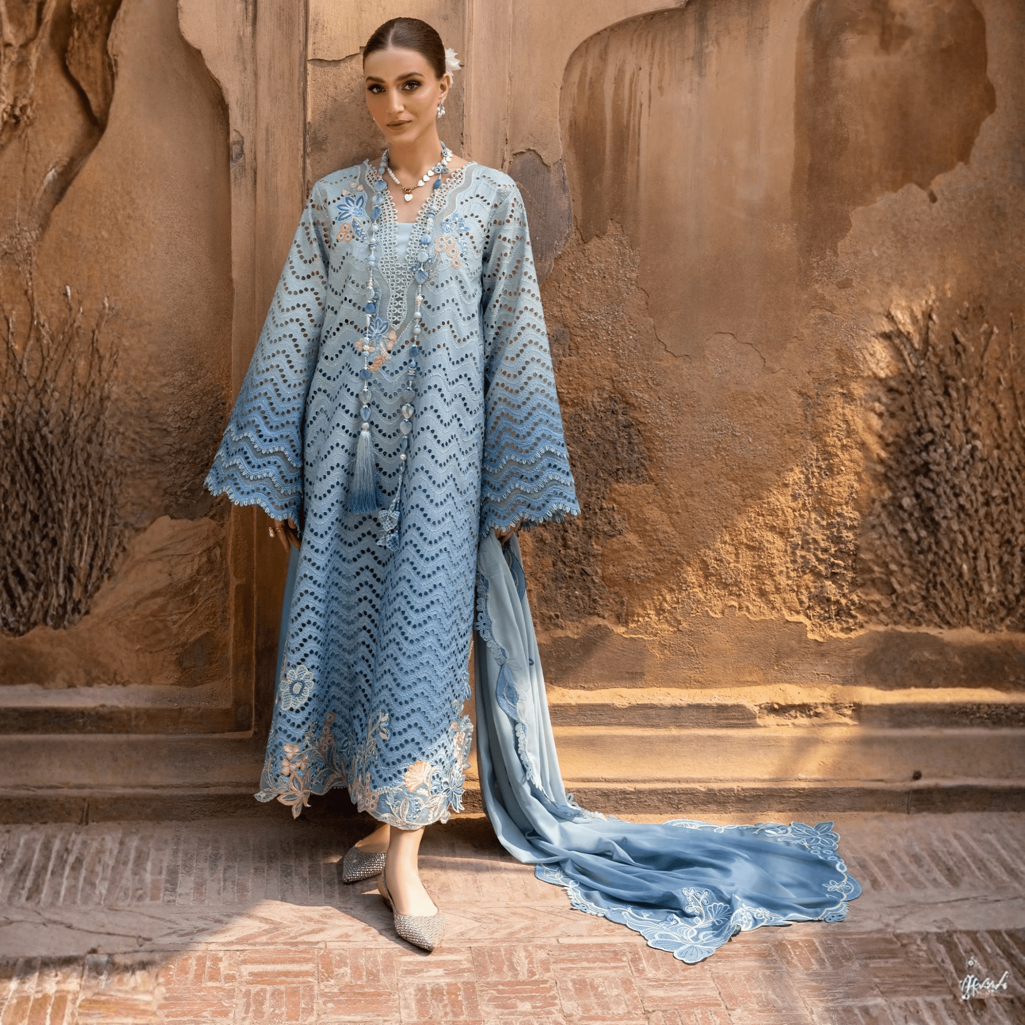 • Clothing: Embroidered/Printed suit for women - Made of best quality fabric - lawn or linen or chiffon - pure silk - Available at Najma Designs & Co. • Jewelry: Gold - plated stud earrings for