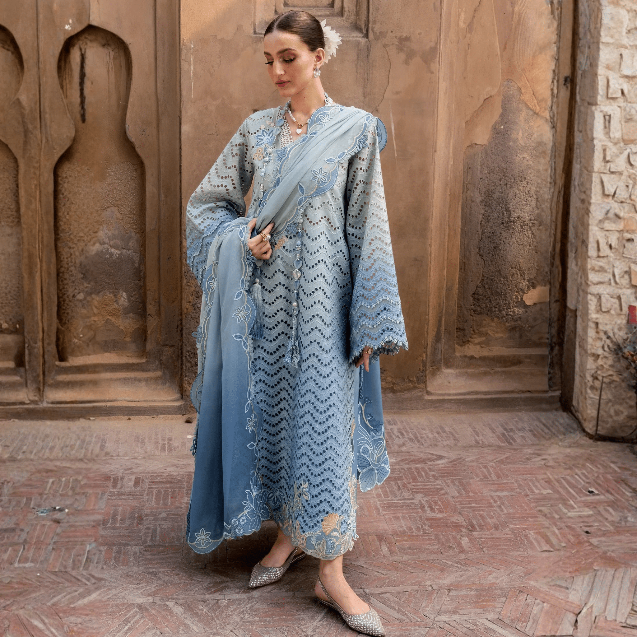 • Clothing: Embroidered/Printed suit for women - Made of best quality fabric - lawn or linen or chiffon - pure silk - Available at Najma Designs & Co. • Jewelry: Gold - plated stud earrings for