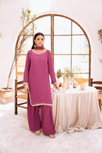 • Clothing: Embroidered/Printed suit for women - Made of best quality fabric - lawn or linen or chiffon - pure silk - Available at Najma Designs & Co. • Jewelry: Gold - plated stud earrings for