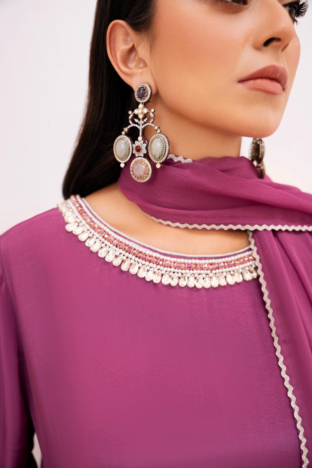 • Clothing: Embroidered/Printed suit for women - Made of best quality fabric - lawn or linen or chiffon - pure silk - Available at Najma Designs & Co. • Jewelry: Gold - plated stud earrings for