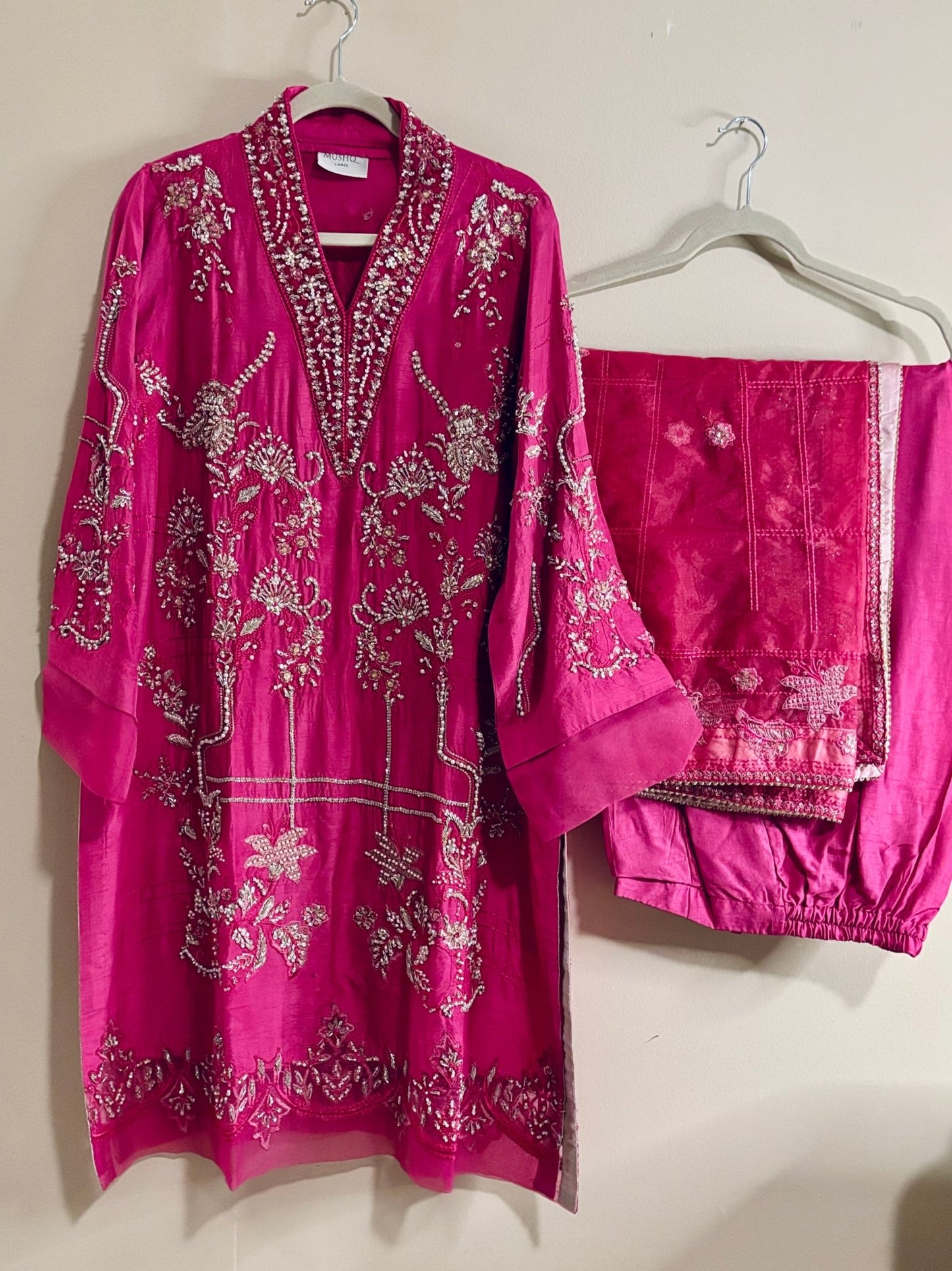 • Clothing: Embroidered/Printed suit for women - Made of best quality fabric - lawn or linen or chiffon - pure silk - Available at Najma Designs & Co. • Jewelry: Gold - plated stud earrings for