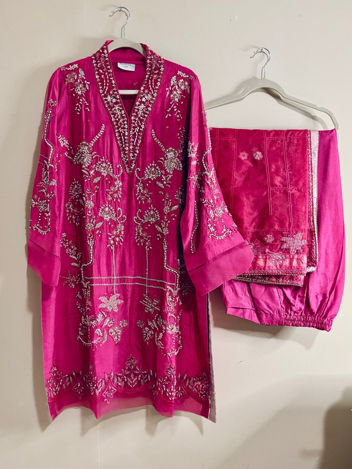 • Clothing: Embroidered/Printed suit for women - Made of best quality fabric - lawn or linen or chiffon - pure silk - Available at Najma Designs & Co. • Jewelry: Gold - plated stud earrings for