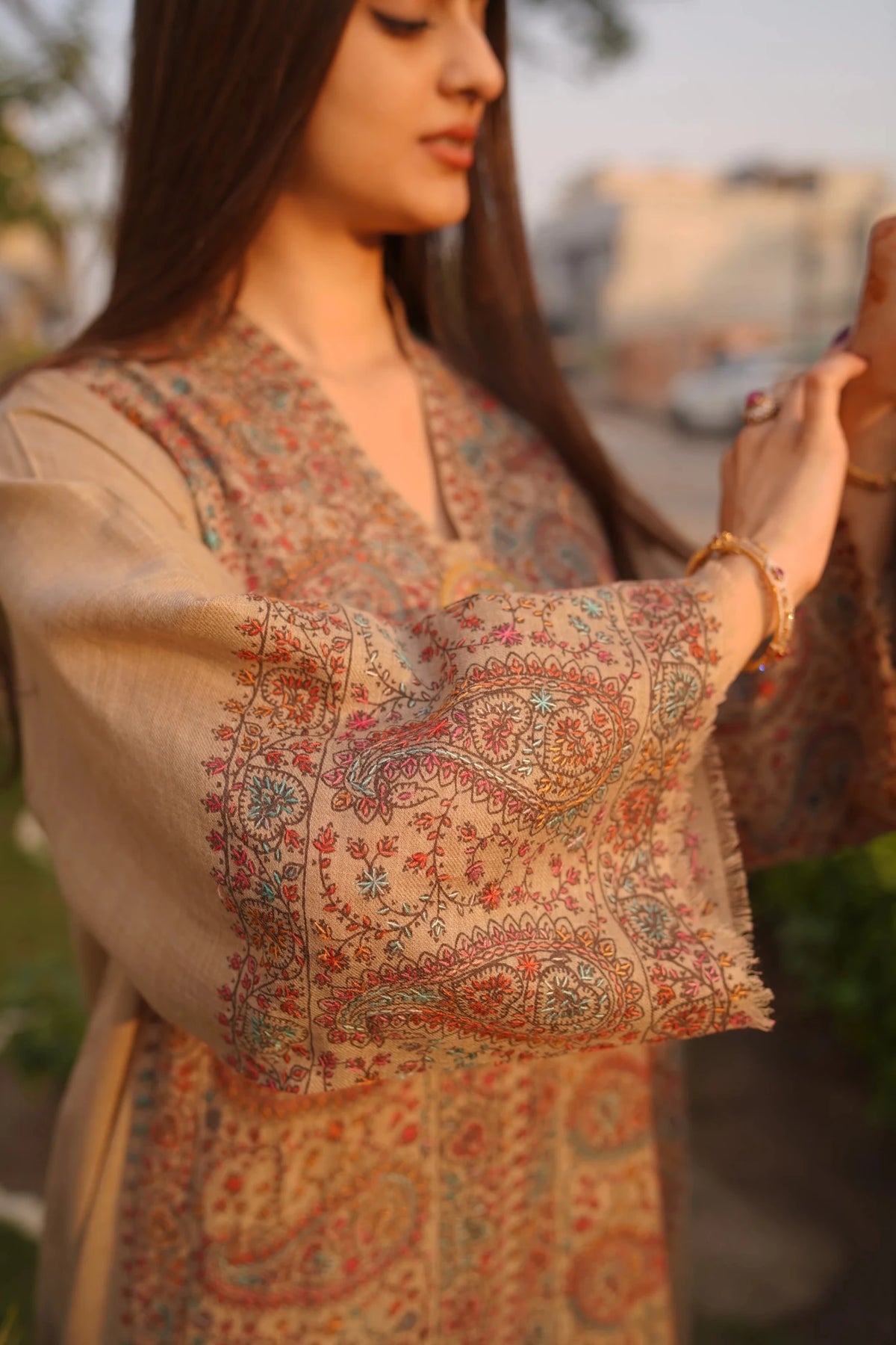 • Clothing: Embroidered/Printed suit for women - Made of best quality fabric - lawn or linen or chiffon- pure silk - Available at Najma Designs & Co. • Jewelry: Gold-plated stud earrings for