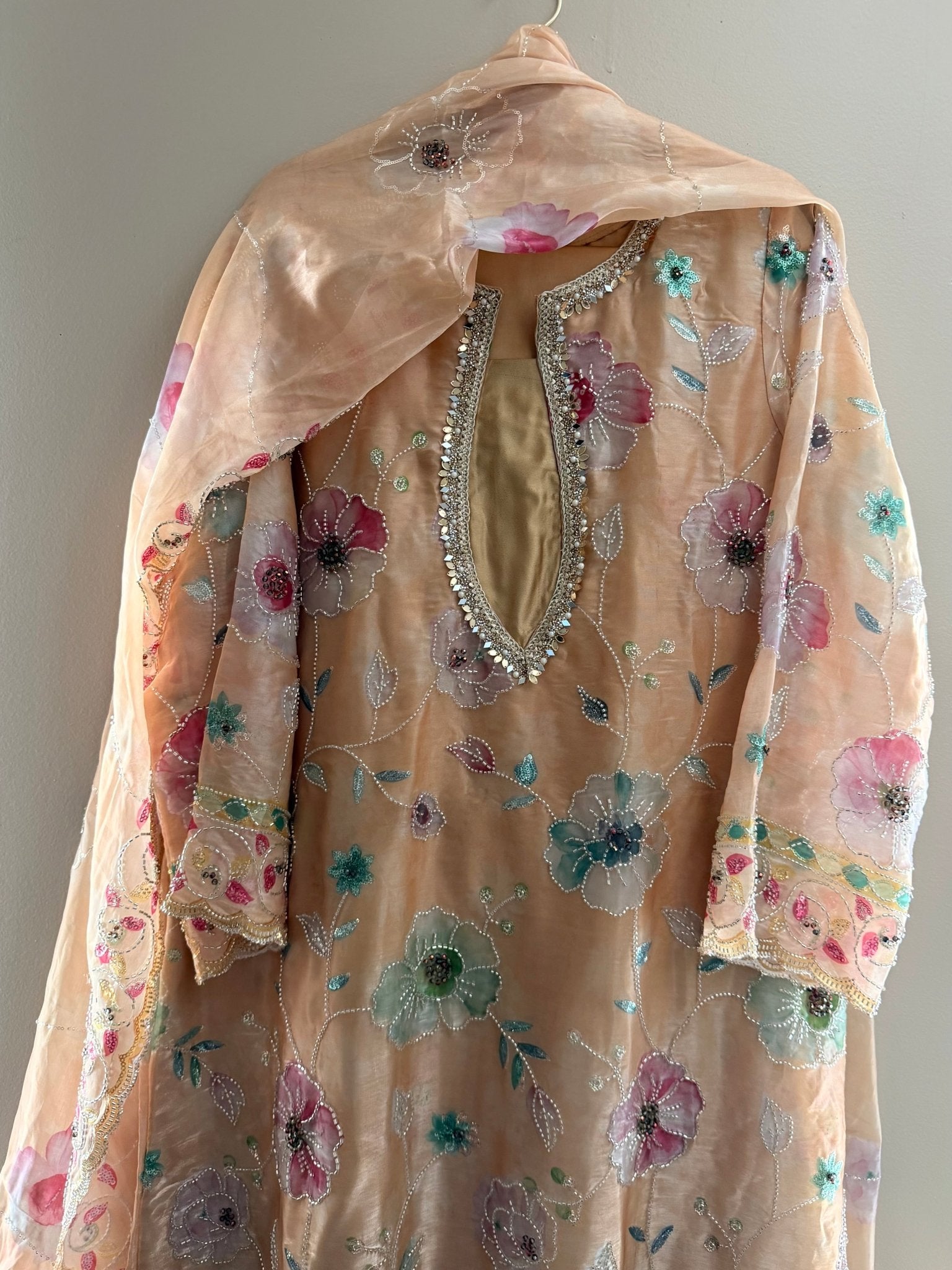 • Clothing: Embroidered/Printed suit for women - Made of best quality fabric - lawn or linen or chiffon - pure silk - Available at Najma Designs & Co. • Jewelry: Gold - plated stud earrings for