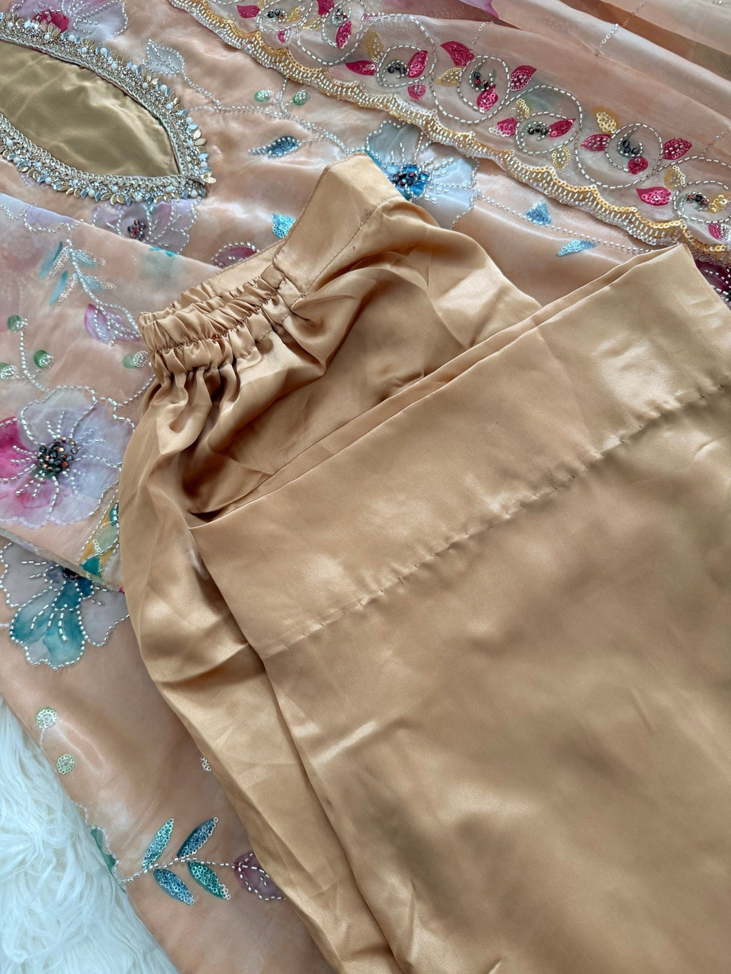 • Clothing: Embroidered/Printed suit for women - Made of best quality fabric - lawn or linen or chiffon - pure silk - Available at Najma Designs & Co. • Jewelry: Gold - plated stud earrings for