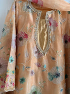 • Clothing: Embroidered/Printed suit for women - Made of best quality fabric - lawn or linen or chiffon - pure silk - Available at Najma Designs & Co. • Jewelry: Gold - plated stud earrings for