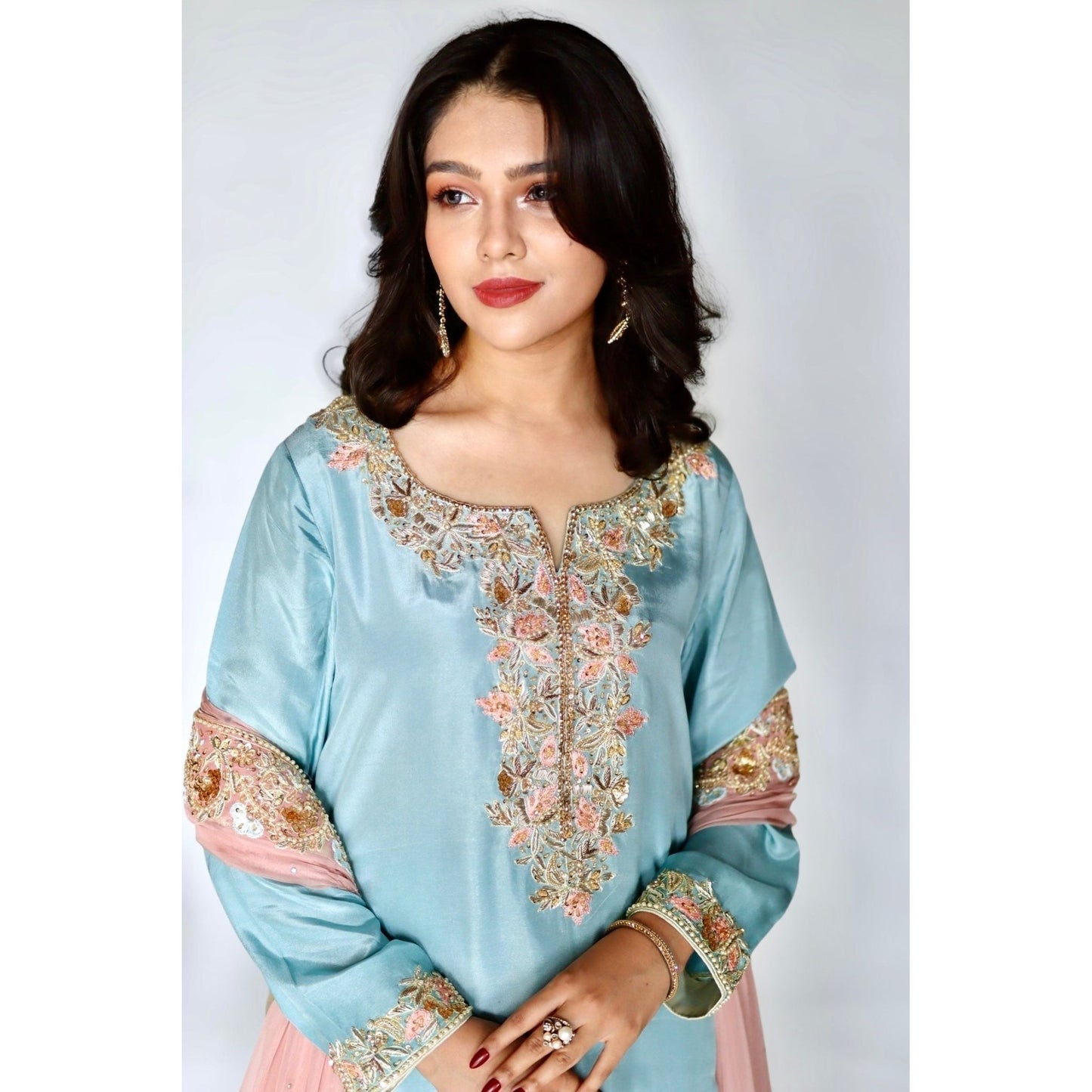 • Clothing: Embroidered/Printed suit for women - Made of best quality fabric - lawn or linen or chiffon - pure silk - Available at Najma Designs & Co. • Jewelry: Gold - plated stud earrings for
