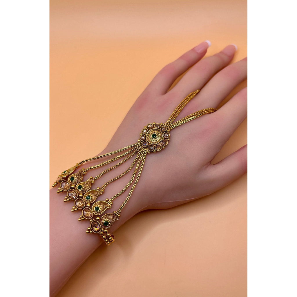 This elegant hand bracelet and ring set is crafted with premium quality brass and features a luxurious gold plating. Its exquisite design and high-quality materials make it a perfect addition to any jewelry collection. Upgrade your style with this premium hand bracelet and ring set today.&nbsp;
