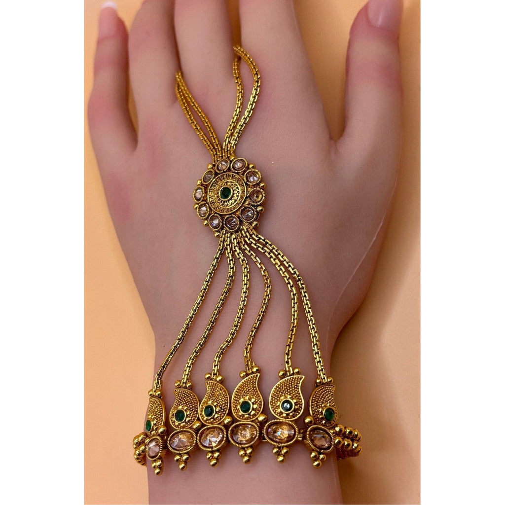 This elegant hand bracelet and ring set is crafted with premium quality brass and features a luxurious gold plating. Its exquisite design and high-quality materials make it a perfect addition to any jewelry collection. Upgrade your style with this premium hand bracelet and ring set today.&nbsp;
