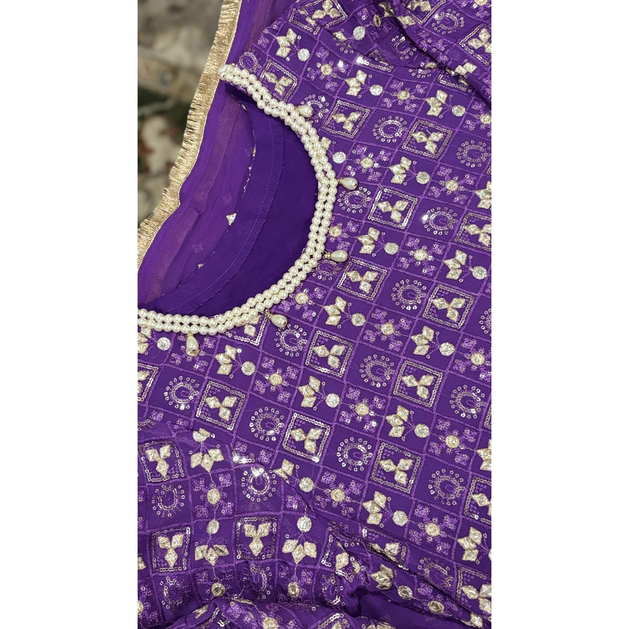 • Clothing: Embroidered/Printed suit for women - Made of best quality fabric - lawn or linen or chiffon - pure silk - Available at Najma Designs & Co. • Jewelry: Gold - plated stud earrings for