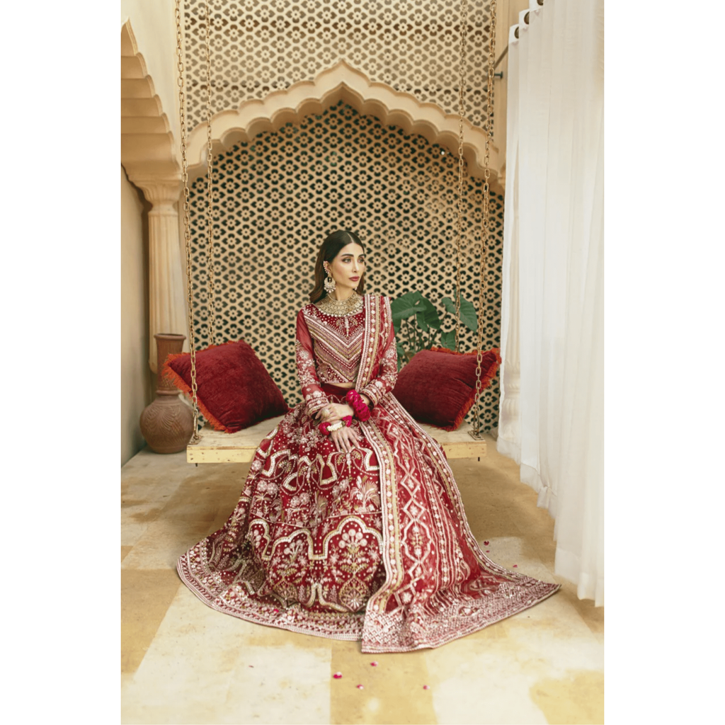Stitched Two-Tone Red Lehnga with Antique Gold Embellishments, Ornate Design on Panels, Sleeves, Bodice, and Neckline, Unique Bronze 'Panni' Dupatta with Silver Jamawar Borders, Organza Fabric, Luxe and Grand Statement Piece