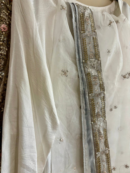 • Clothing: Embroidered/Printed suit for women - Made of best quality fabric - lawn or linen or chiffon - pure silk - Available at Najma Designs & Co. • Jewelry: Gold - plated stud earrings for