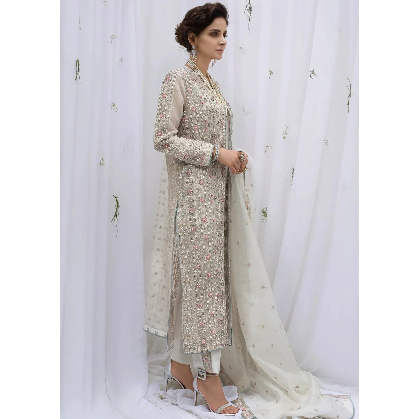 • Clothing: Embroidered/Printed suit for women - Made of best quality fabric - lawn or linen or chiffon - pure silk - Available at Najma Designs & Co. • Jewelry: Gold - plated stud earrings for
